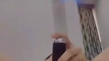 Nude Bhabhi presses boobs and fingers her pussy