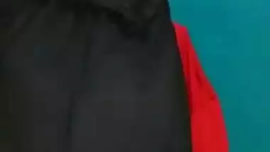 Desi female in a long black skirt exposes legs and boobies in sex show