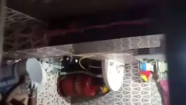 Neighbor aunty taking bath caught by voyeur