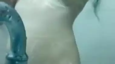 Indian girl always takes a camera when she goes to take a shower