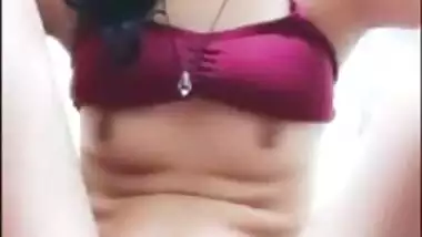 Desi whore in red top and panties broadcasts solo XXX show close-up