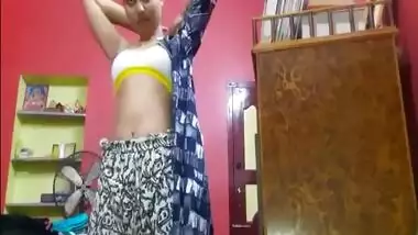 Tempting Desi teen sets camera to film her sex belly during XXX changing