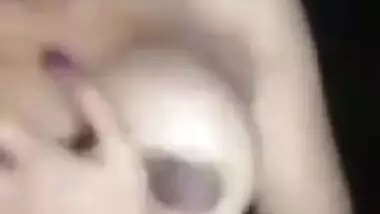 Winning Desi chick takes a shower and poses for the solo porn video