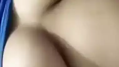 Beautiful desi girl lifting top to reveal sexy boobs