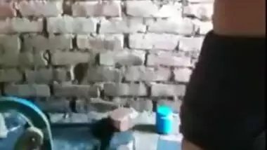 Modest Desi girl has no shower cabin but green bucket to wash herself