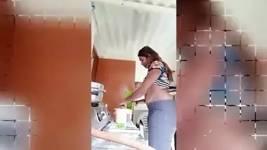 Chubby Desi gal while cooking can barely hide her perky XXX boobs