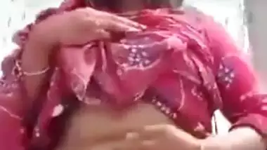 Sexy girl shows her boobs and ass to striptease her BF