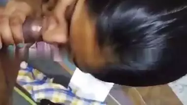 Cute girlfriend in bra giving blowjob to boyfriend