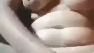 Mallu nude girl presses her juicy boobs and fingers her pussy