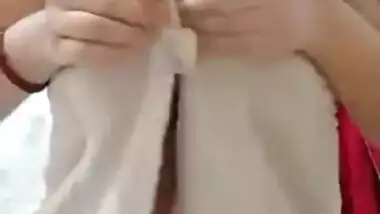 Young Desi babe is proud of juicy XXX melons that she likes to expose