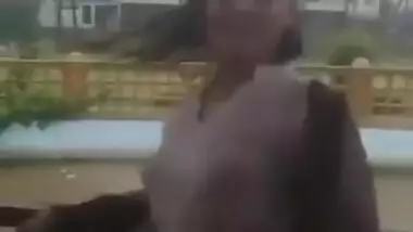 Desi Bhabhi in REsort Dancing in Rain showing her boobs