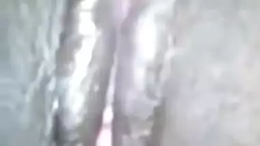 Amateur Desi gal shows she is ready for sex by touching bald XXX twat