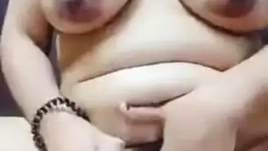 Chubby Desi model with big tits sticks sex toy into her XXX slit